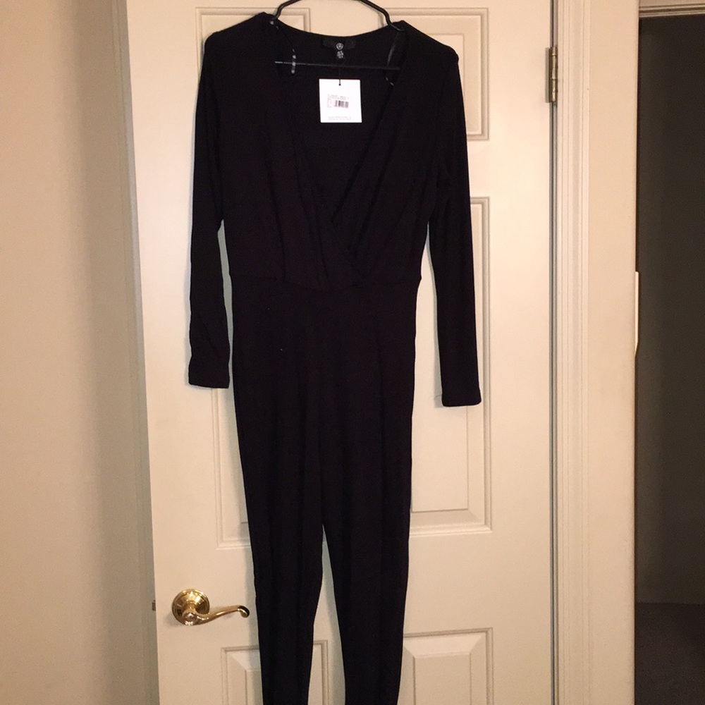 Black wrap top skinny leg jumpsuit